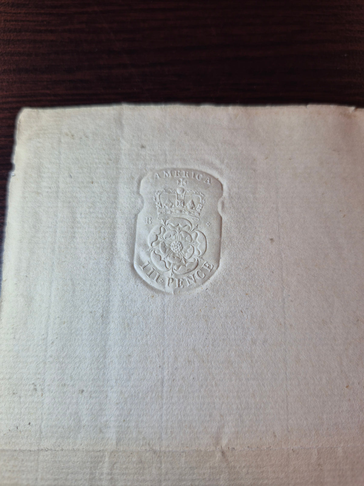 0000QC2605 - QAE2 (RM24) - 1765 America Embossed Revenue Document, UNUSED